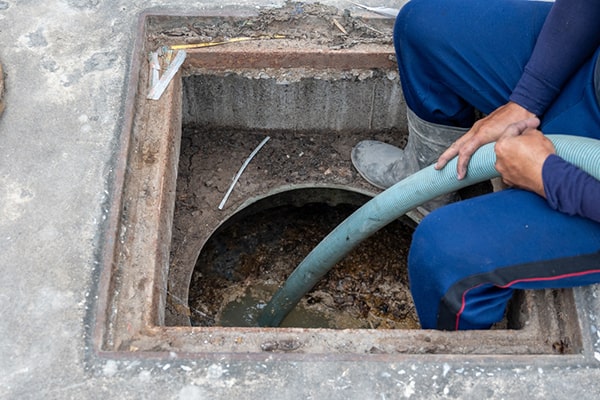 regular grease trap pumping prevents foul odors, clogs, and sewage backups in the plumbing system
